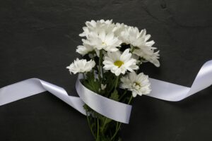 Fleurs du Deuil : Symbolique, Choix et Entretien - ruban